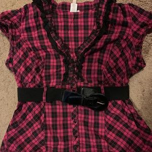 Pink and black shirt with black belt